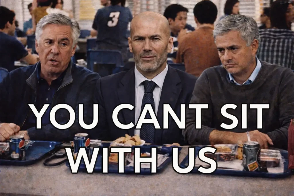 Carlo Ancelotti, Zinedine Zidane, and José Mourinho sit side-by-side at a busy cafeteria table with food trays and Pepsi cans, while large bold text over the image reads “YOU CAN’T SIT WITH US.”